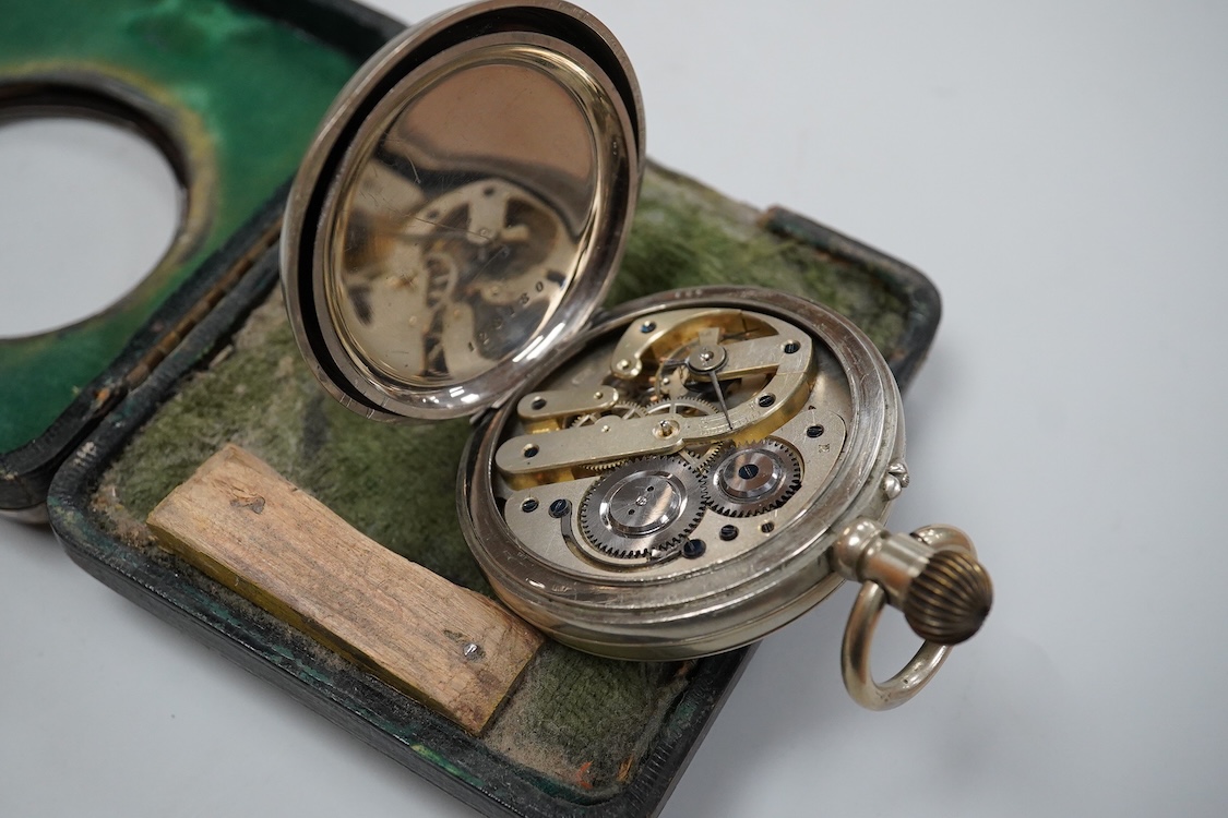 An Edwardian silver and pique inlaid tortoiseshell pocket watch case, Henry Clifford Davis, Birmingham 1909, 11.3cm, containing keyless pocket watch.